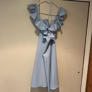 Flowing, ruffled,baby blue dress, polyester and spandex material. Easy wear!
